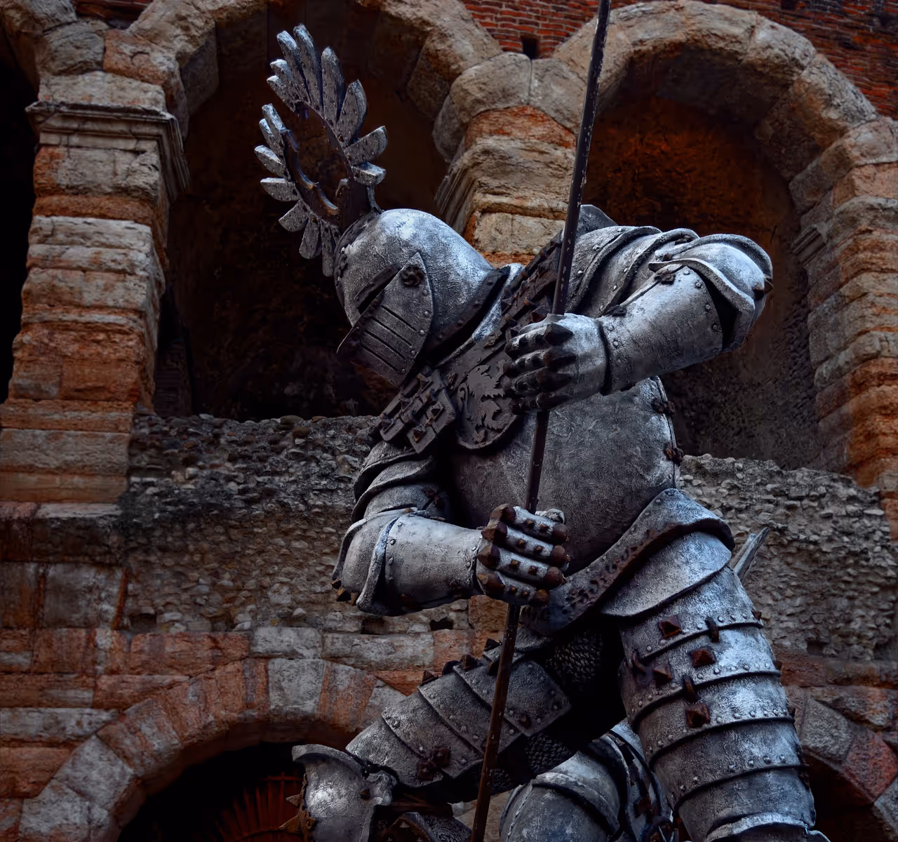 Statue of a knight next to the arena in Verona