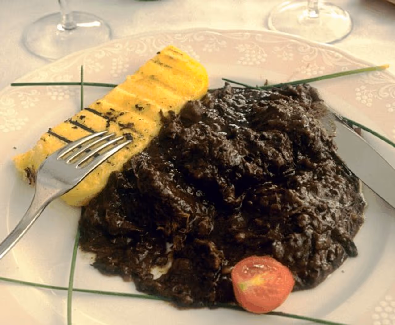 Braised horse meat stew food in Verona