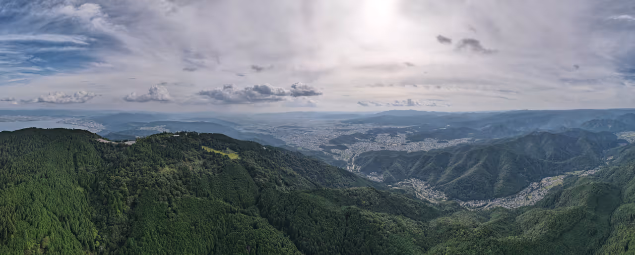 Panoramic shot of Mount Hiei with Kyoto in the distance